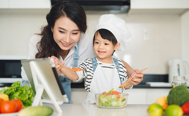 Emotional intelligence: Child learning to cook