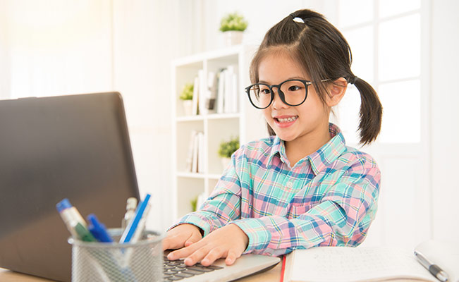 Child learning on computer