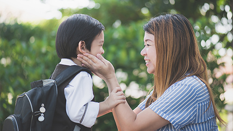 Mom sending child off to school