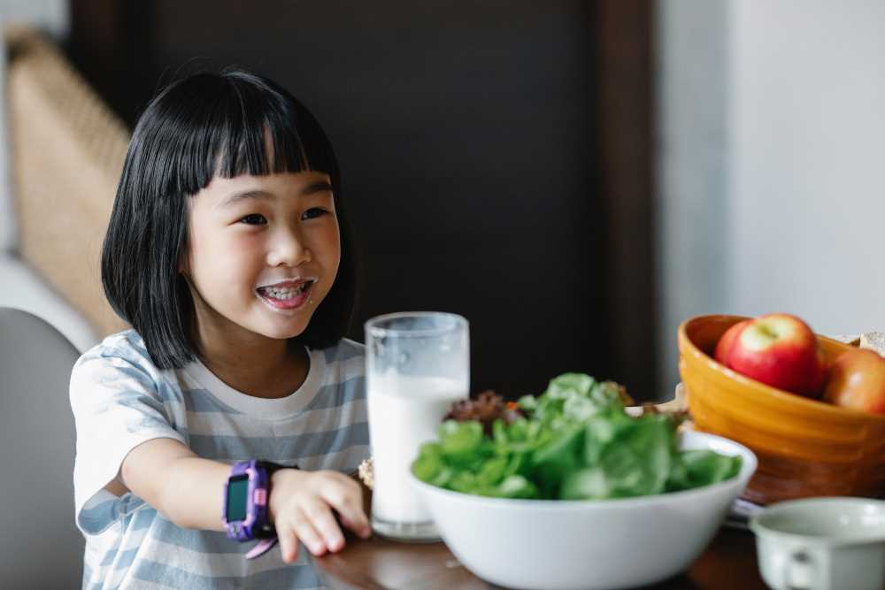 Child eating healthy food