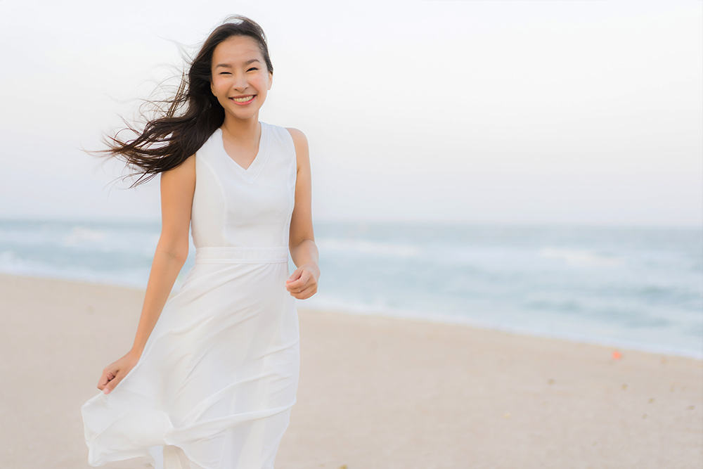 portrait-beautiful-young-asian-woman-happy-smile-beach-sea-ocean